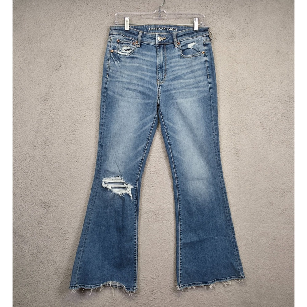 American Eagle Jeans Womens 8 Blue Flared Light Wash Distressed Ripped‎ Raw Hem